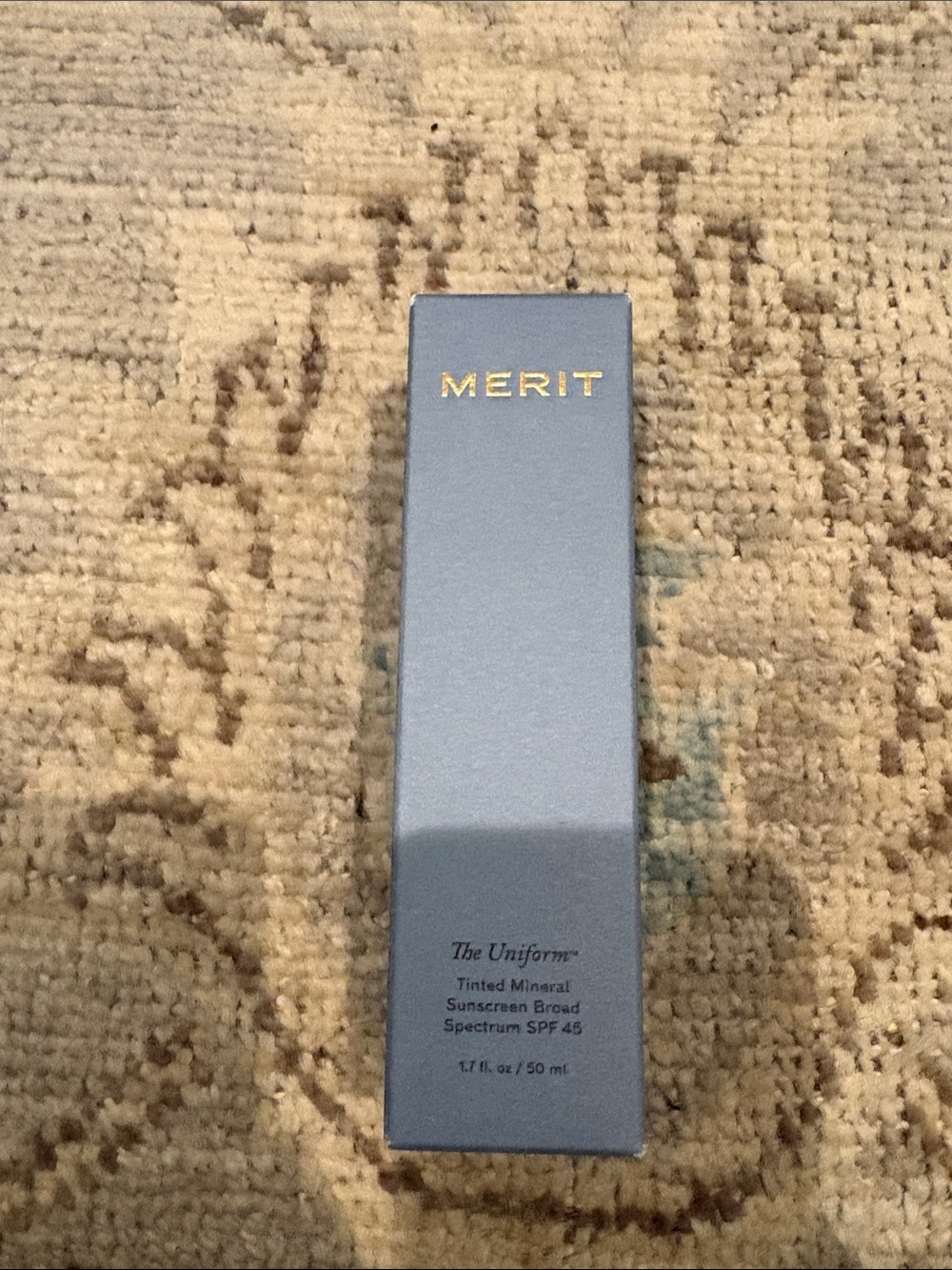 Merit The Uniform Tinted Mineral Sunscreen SPF 45 — Gray Packaging